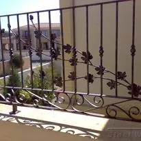 Recent job: wrought-iron style balcony railing with leaf detailing